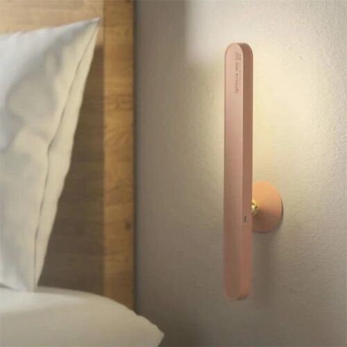 Solid wood LED wall lamp.